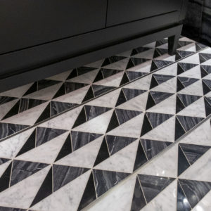 Bronzework Studio Precision Square Liner Stainless Steel metal accent black and white patterned stone floor