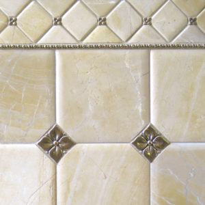 Bronzework Studio Classic Blooming Leaf .63-inch, 2.5-inch insets and Roman metal accent liner tiles with limestone