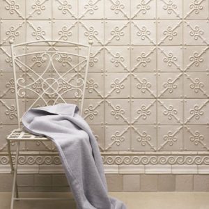 Talisman Swan's Trumpet, Liner, Spiral Wave border, Crown Molding white ceramic tile bathroom display